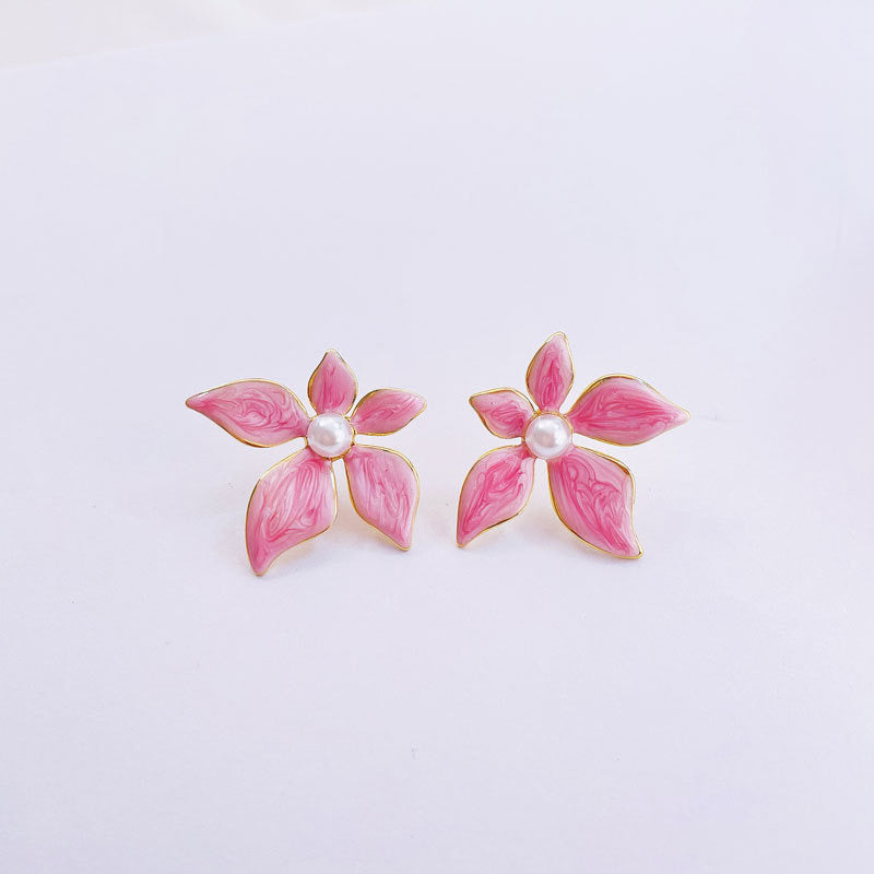 Boucles d’oreilles la fleur rose