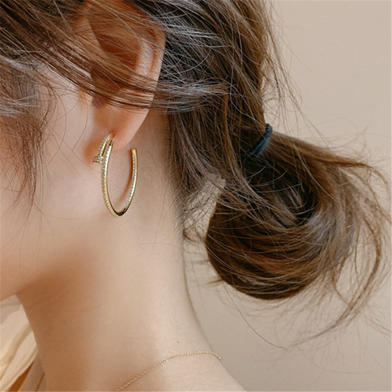 Boucles d’oreilles étreinte